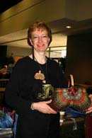 Anne Bowers with one of her inimitable ribbed baskets.  Maybe not so inimitable after all. she teaches others how to make them.
