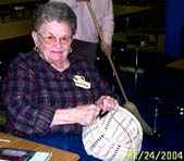 Madeline finishes up her Ginger McGhee class basket at Country Weavers 2003 Weave-in 