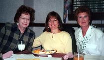 Jean Lovelace,left, and DeVonna Mathis, right, get together for one last breakfast board meeting with Susan Reed-Fanfoni.