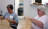 Sisters Candice Williams & Vicki Worrell weave a Miss Jimmie basket